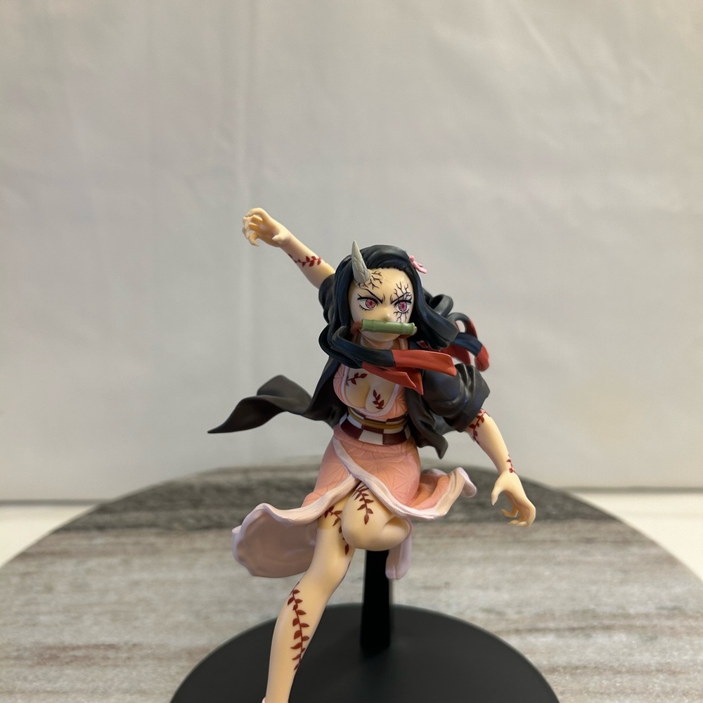 Anime Demon Slayer Figure with Pink and Black Outfit